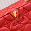M23999 red. This Monogram embroidered floral design emerges in the elegant quilting, adding to the Louis Vuitton store's decoration style for the Capucines BB handbag. 33 x 19 x 9 cm
