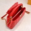 M23999 red. This Monogram embroidered floral design emerges in the elegant quilting, adding to the Louis Vuitton store's decoration style for the Capucines BB handbag. 33 x 19 x 9 cm