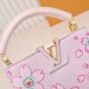 Capucines Mini Model: 13249 Pink Material: Plain Textured Painted Design Hardware Upgrade Highlights: LV logo, unique edge ring, intricate Monogram flowers on the flip cover. Size: 21×14×8cm