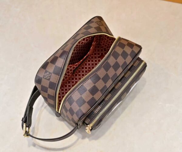 This Locker Dopp Kit comes in Monogram fabric and measures 23.0 x 13.0 x 12.0 centimeters (length x height x width).