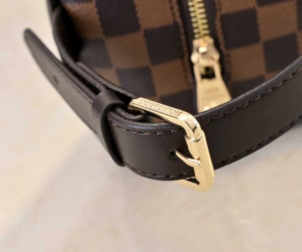 This Locker Dopp Kit comes in Monogram fabric and measures 23.0 x 13.0 x 12.0 centimeters (length x height x width).