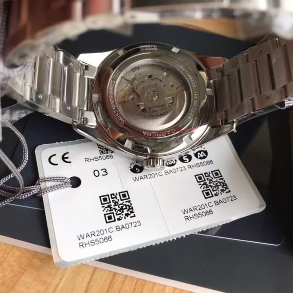 TAG Heuer Carrera Automatic, 41 mm, Steel WAR201C.BA0723 The 41mm day-date model displays the refined the TAG Heuer Carrera styling to perfection. The contrast of black dial and rose gold-plated hands, indexes, logo and Day-Date window is impactful and alluring.