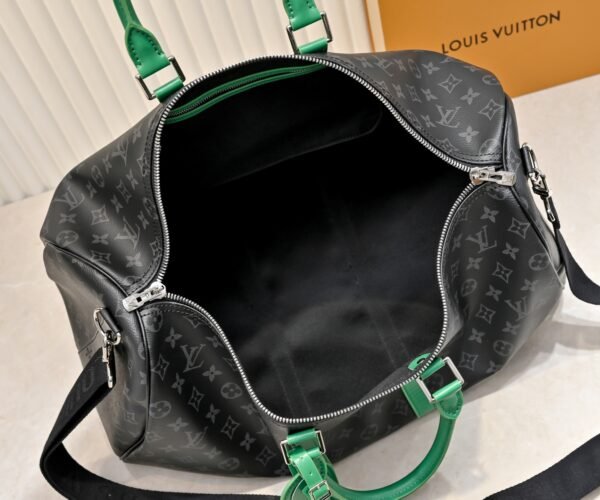 M26434 M41416 This model Keepall Bandouliere 50 travel bag is made of Monogram Eclipse canvas. Dimensions: 50x29x23cm