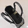 M21546 black perforated 53824 53826 This model "On My Side" small handbag is made of cowhide leather. Dimensions: 25.0 x 20.0 x 12.0 cm (length x height x width)